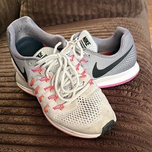 Nike Women's Running Shoes in Gray with Pink Highlights